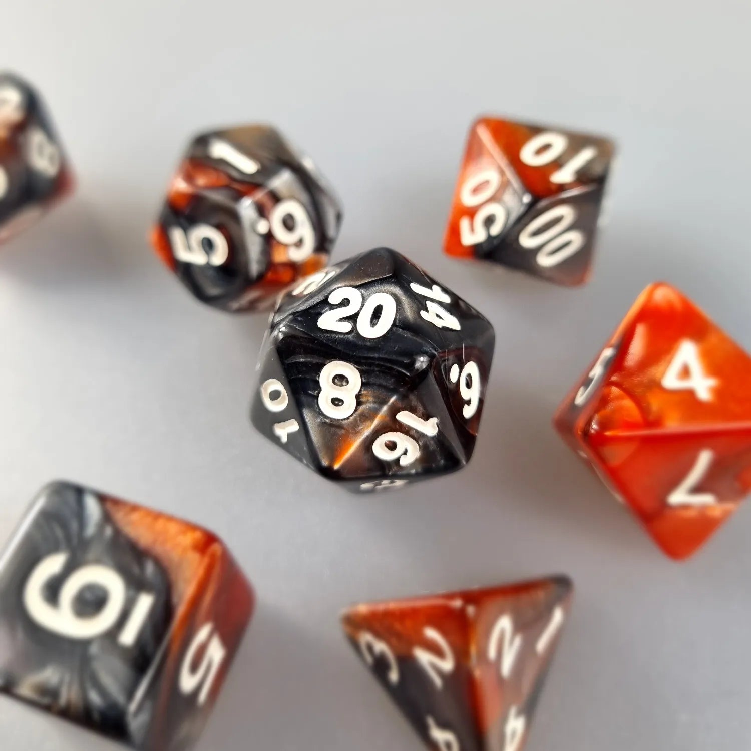 Orange & Black Dual Swirl Dungeons & Dragons Dice Set