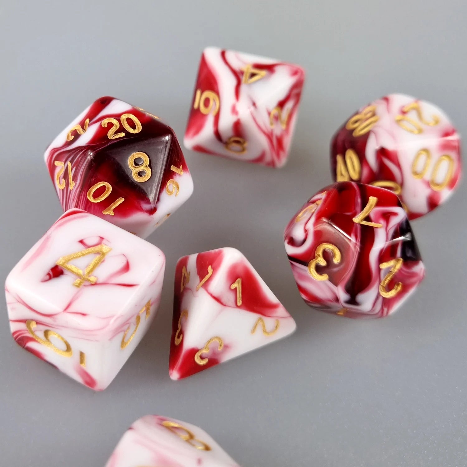 White & Red Dual Swirl Dungeons & Dragons Dice Set